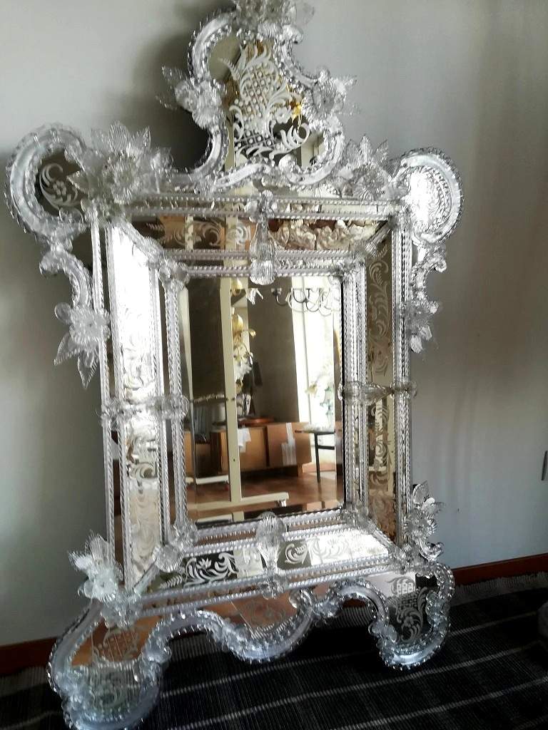 restoration process of an ancient Venetian mirror