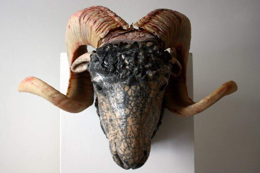 Raku ceramic and horns.