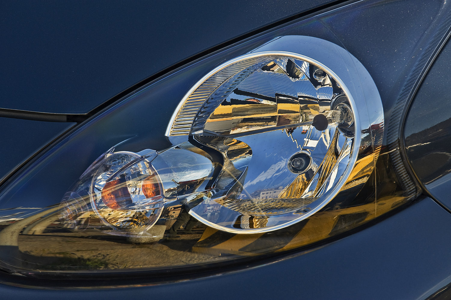reflections in a car's headlight