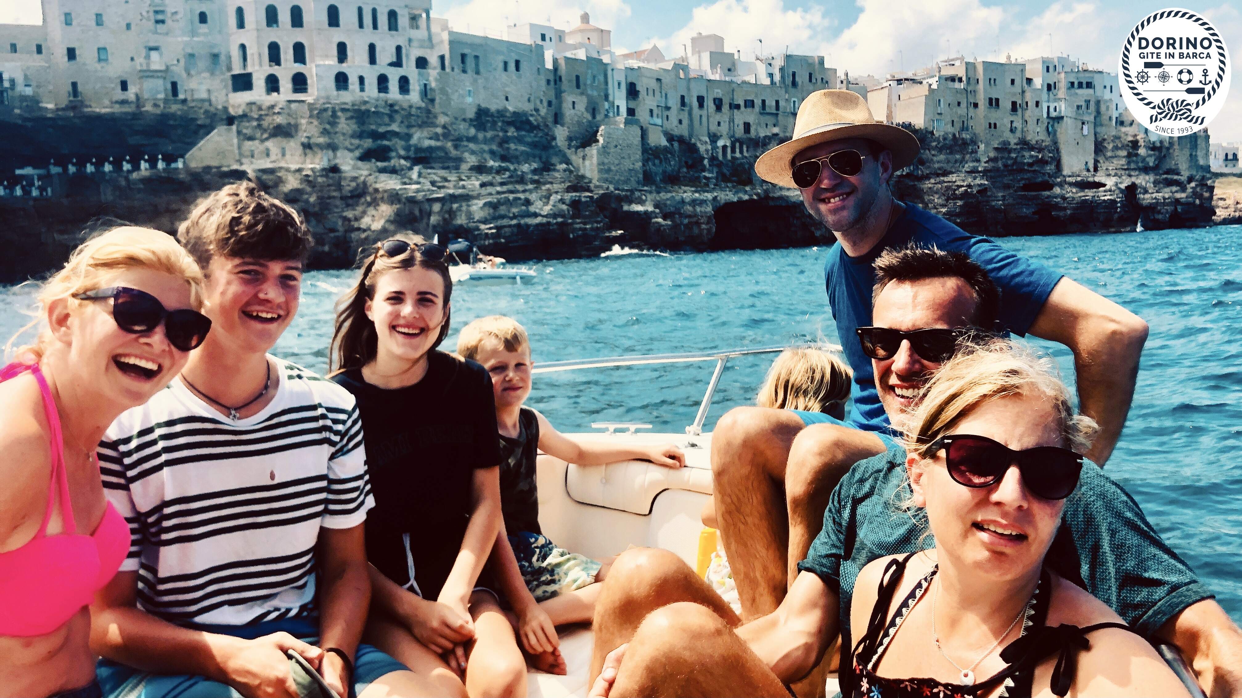 An American family on vacation in Polignano with Dorino Gite in Barca