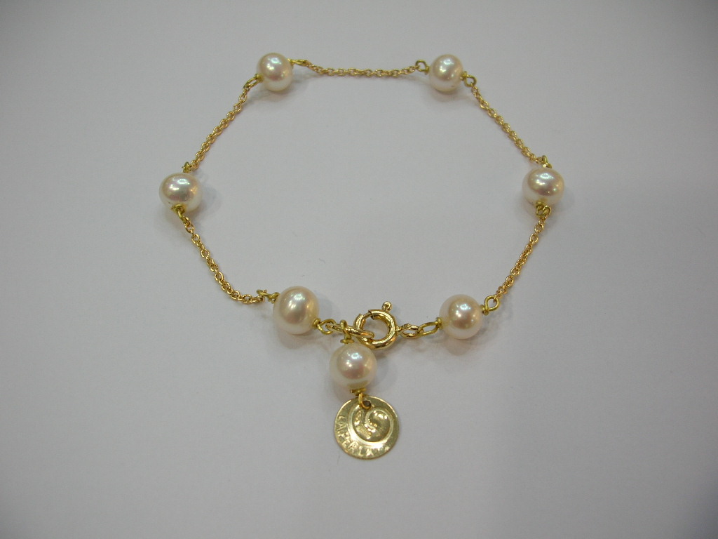 Bracciale in perle coltivate e oro giallo