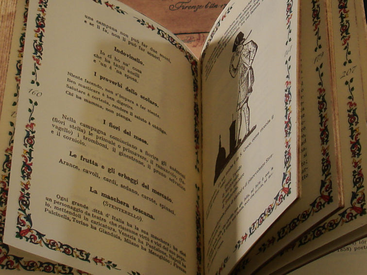 Libro aperto  su la maschera di Firenze
Interno del libro Almanacco Toscano