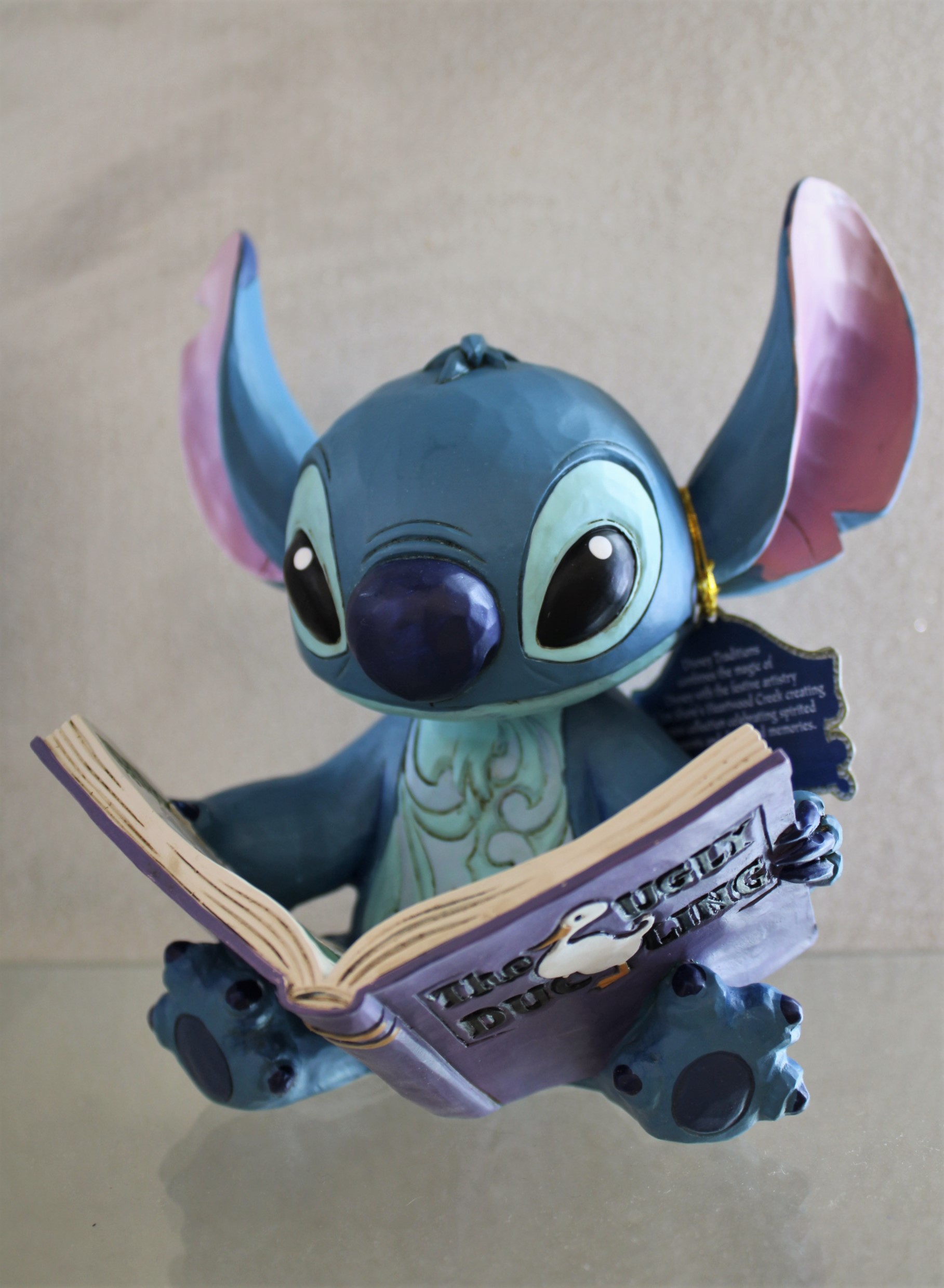 STITCH CON LO STORYBOOK DISNEY TRADITIONS JIM SHORE