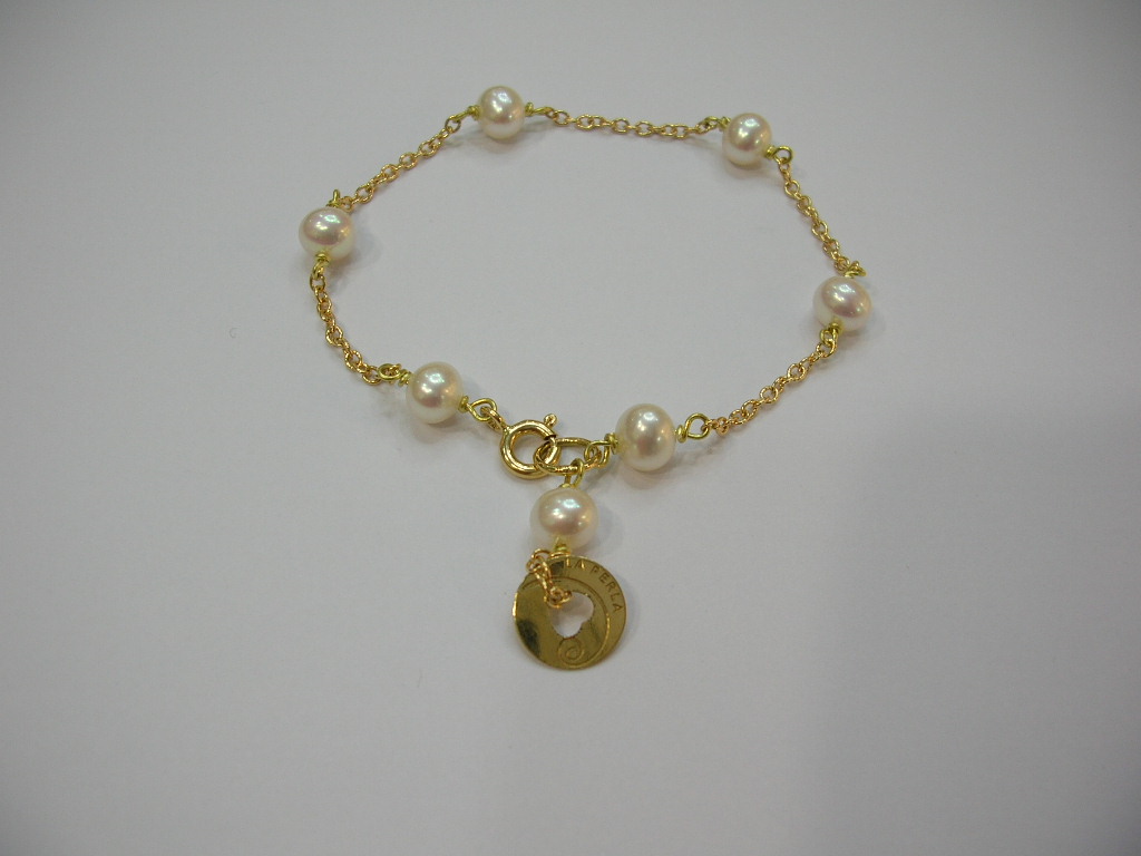 Bracciale in perle coltivate naturali e oro giallo