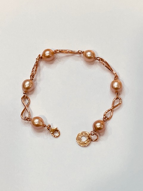 Bracciale "Infinito" in oro rosa e perle coltivate naturali