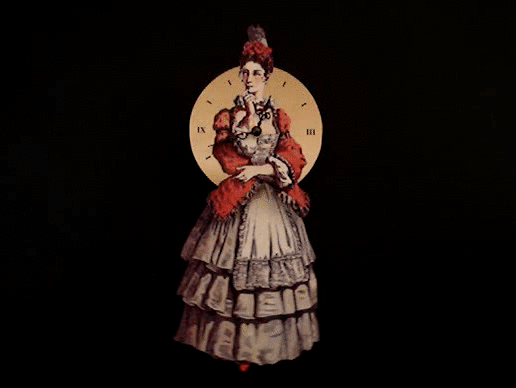 Orologio da parete con immagine di Colombina che oscilla la gonna tipo danza del ventre
