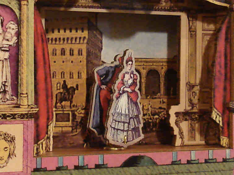 Dettaglio di Pantalo e Colombina nel Teatro Musicale in Legno con Angeli