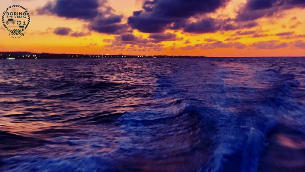 tramonto dalla barca di escursioni con dorino gite in barca