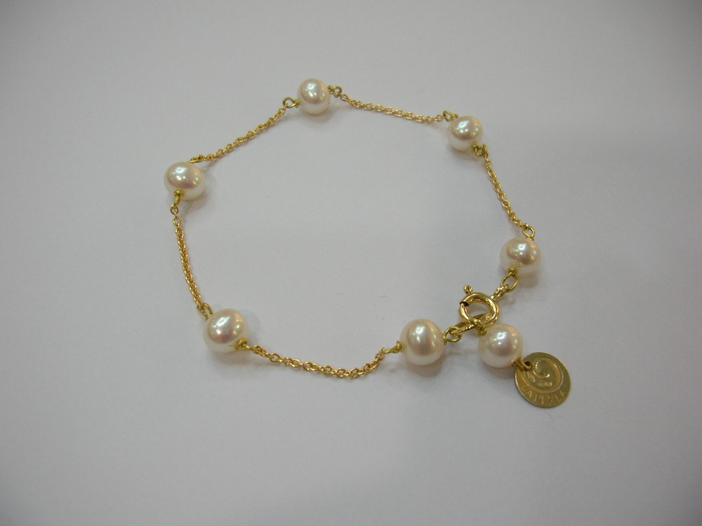 Bracciale in perle coltivate e oro giallo